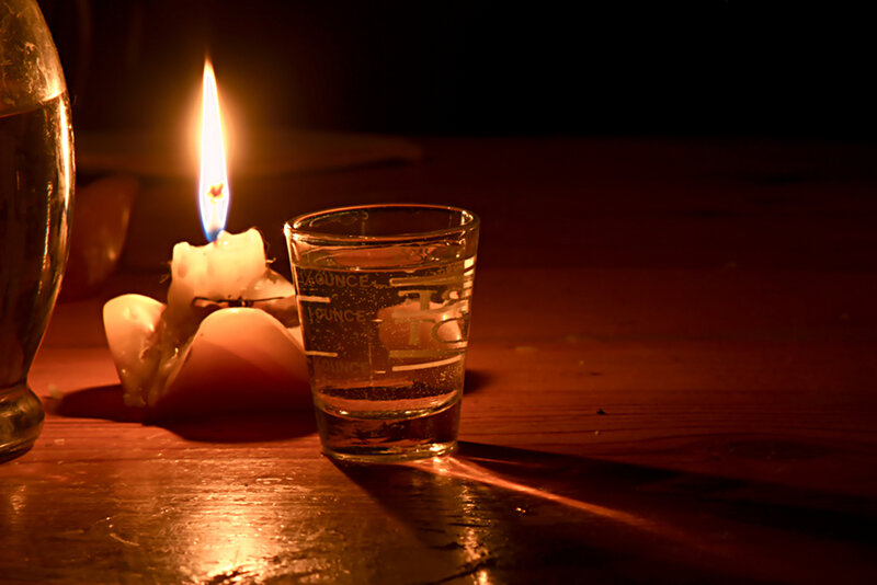 Candlelight with shot glass