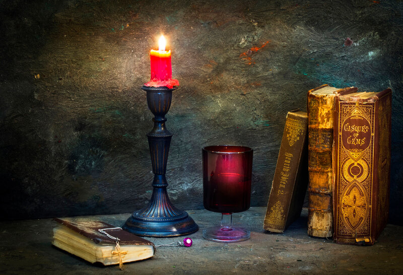 Candlelit Books and Glass