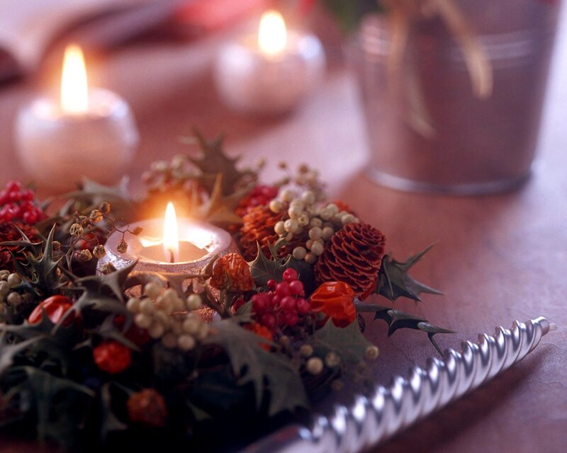 Candlelit holiday arrangement