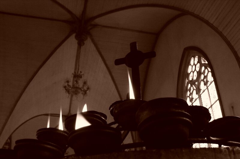 Candles and Cross in Church