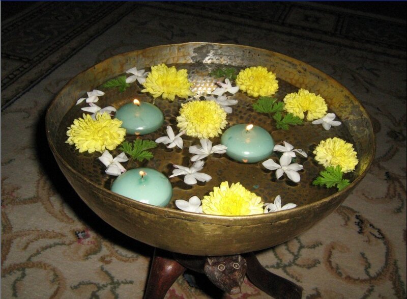 Candles and flowers in a bowl