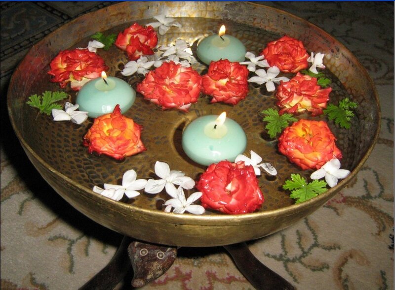 Candles and flowers in a bowl