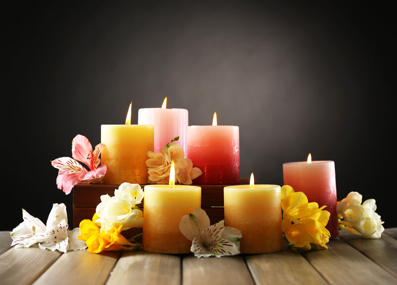 Candles and Flowers on Wood