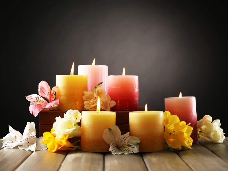 Candles and Flowers on Wood — Yellow