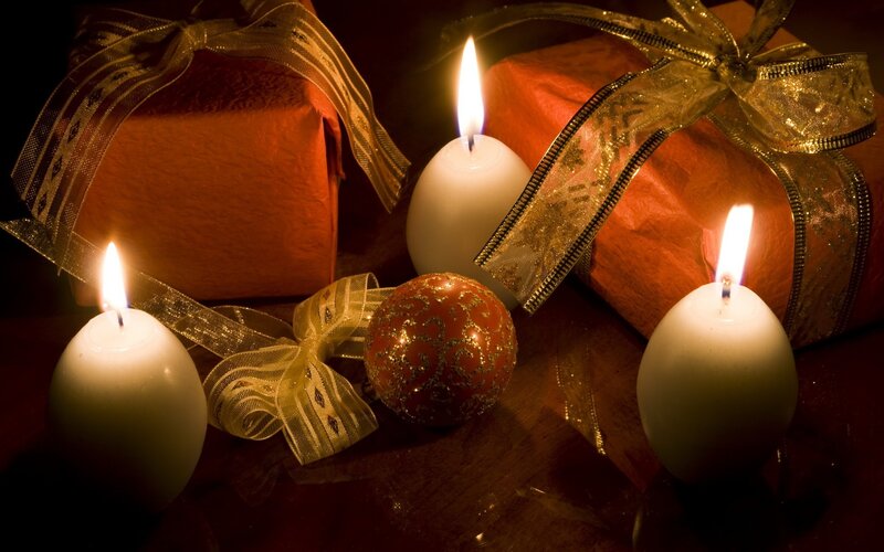 Candles and gifts at night