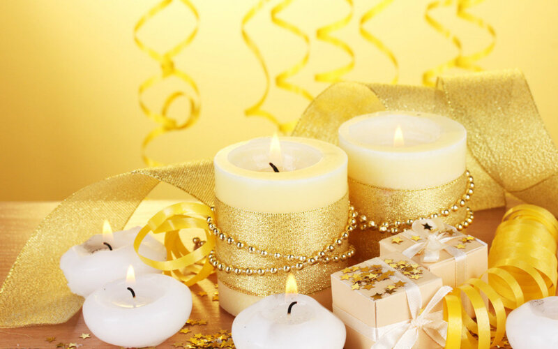 Candles and Gifts on Table — Yellow