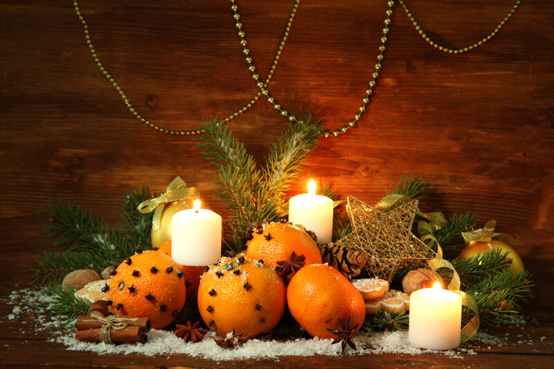 Candles and Oranges on Wood