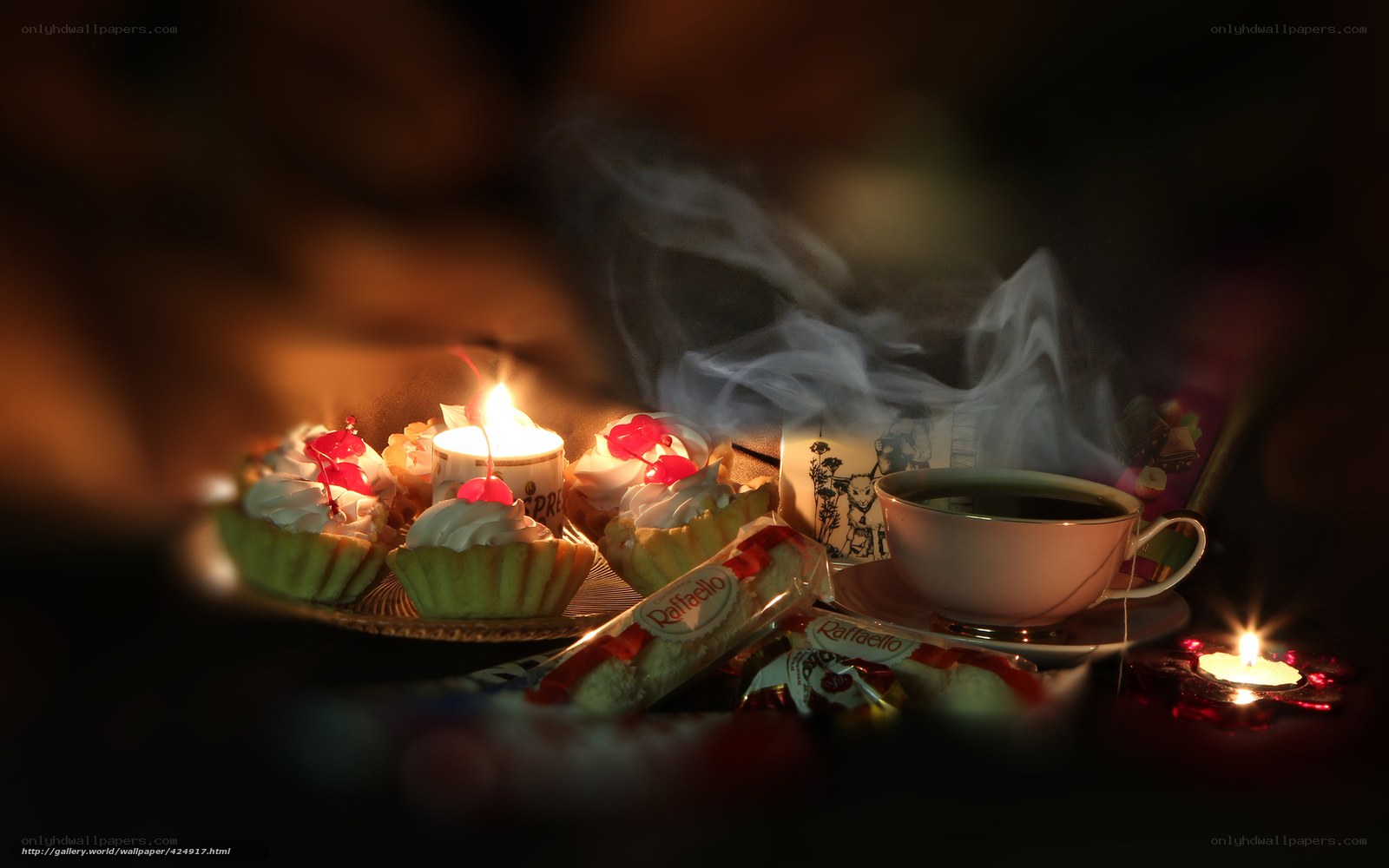 Candles and pastries on a tray