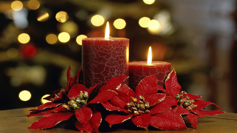 Candles and poinsettias