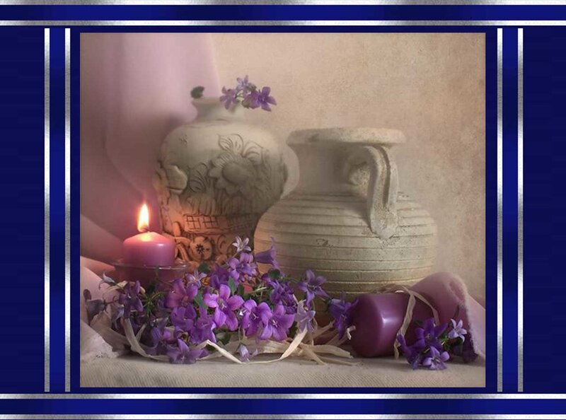Candles and purple flowers