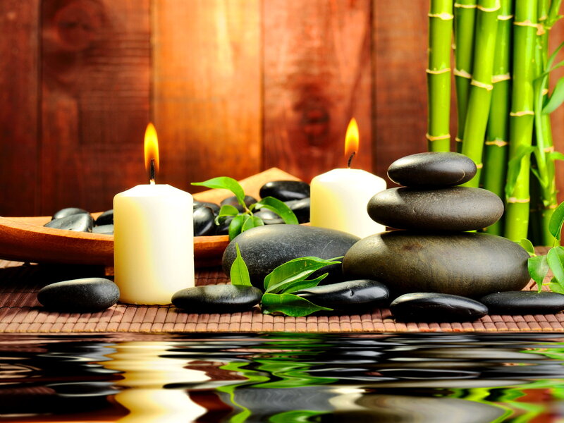 Candles and Stones on Mat