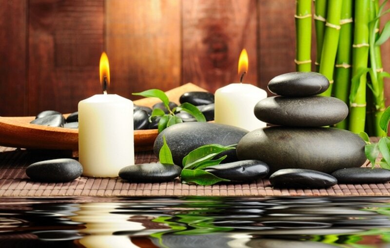 Candles and Stones on Water