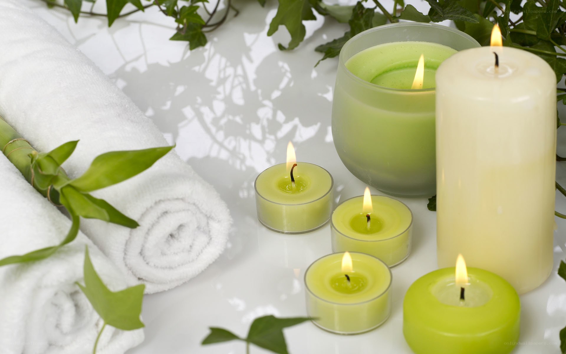 Candles and towels in spa setting