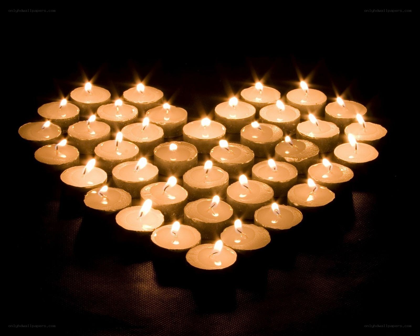 Candles arranged in a heart shape