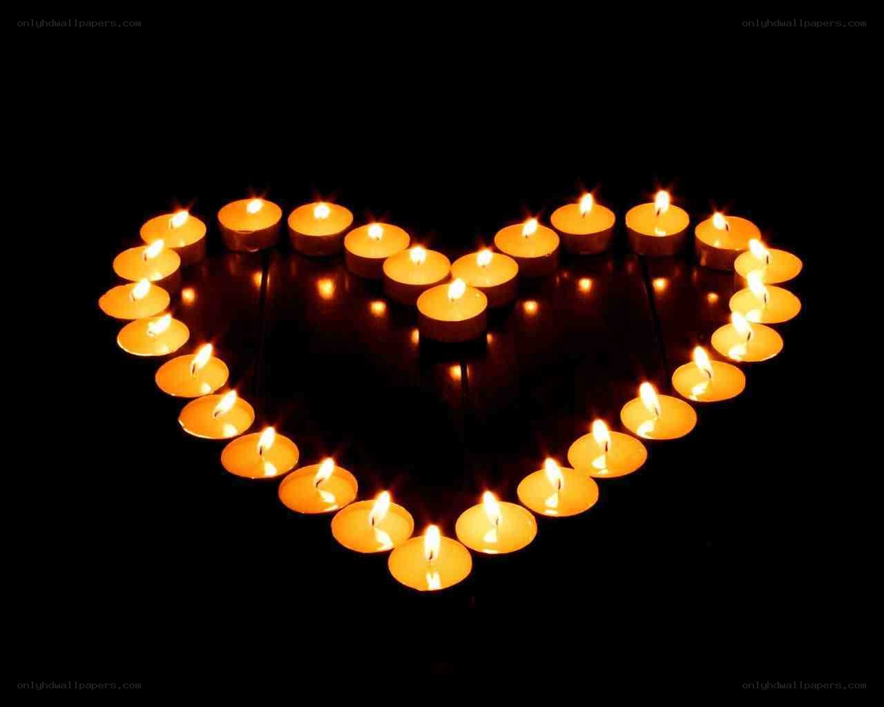 Candles arranged in a heart shape