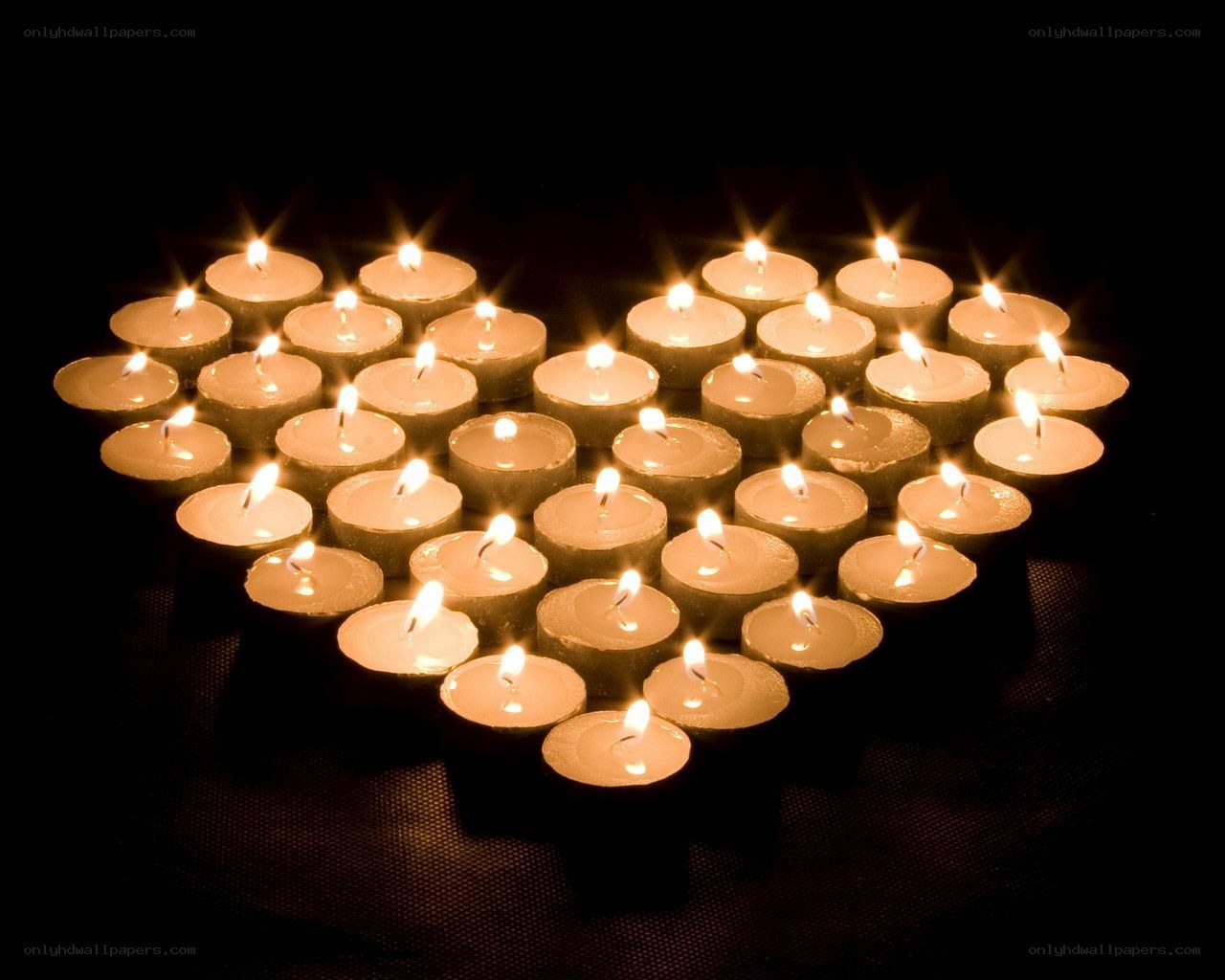 Candles arranged in a heart shape