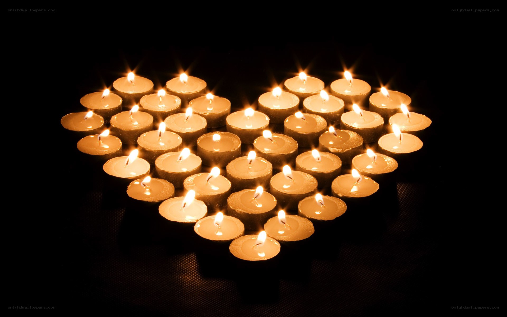 Candles arranged in a heart shape