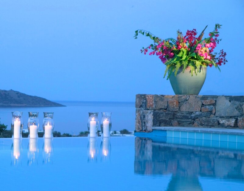 Candles by Pool at Dusk