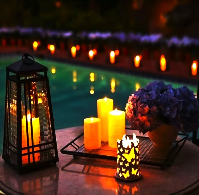 Candles by Pool at Night