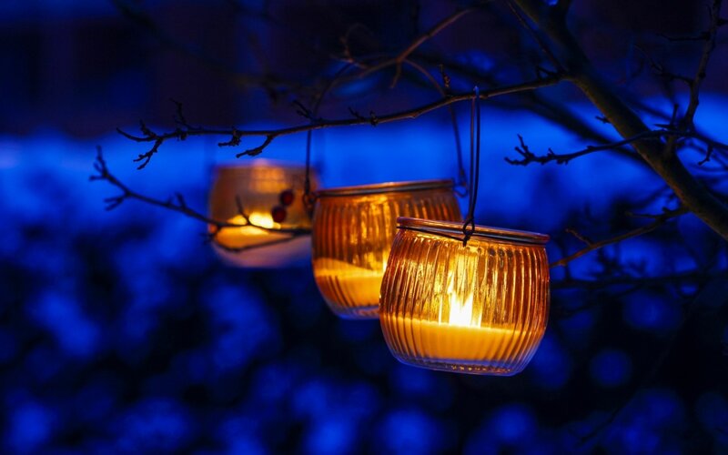 Candles Hanging from Tree
