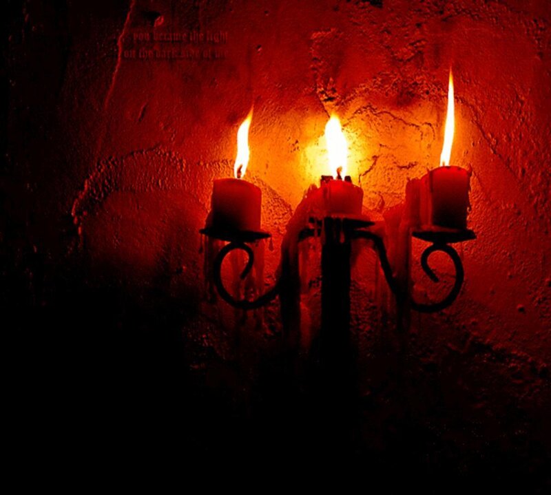 Candles in a dark cave