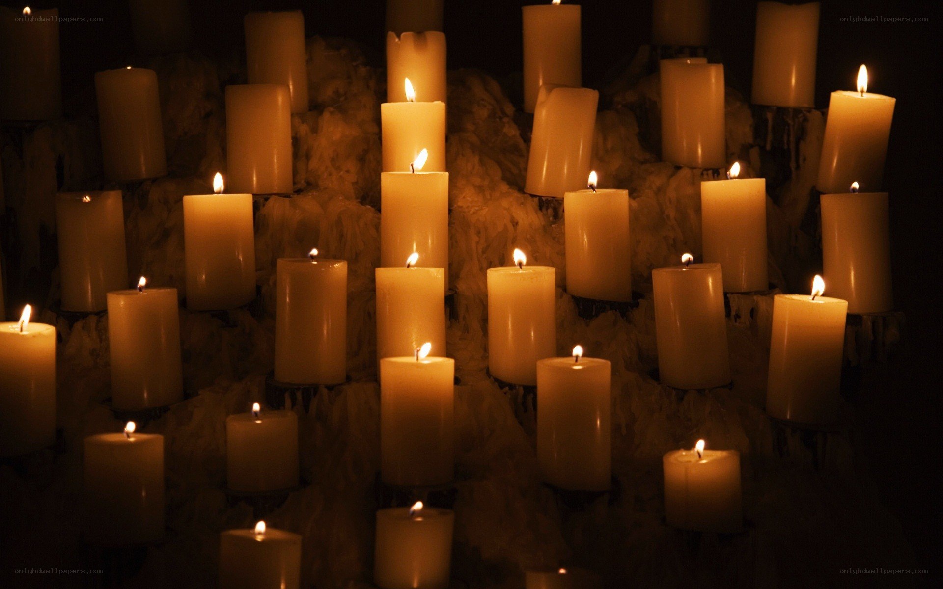 Candles in a dark space
