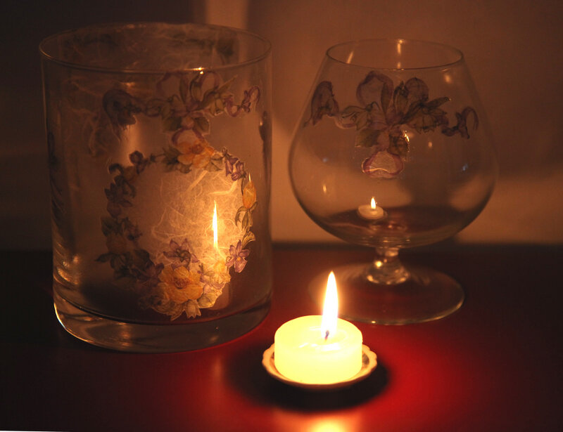 candles in glass holders