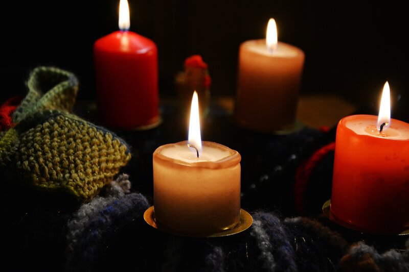 Candles on a knitted surface