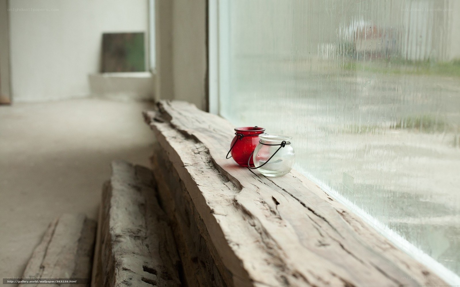 Candles on a wooden windowsill