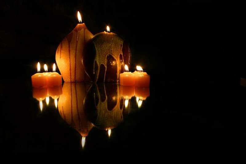 Candles on Reflective Surface