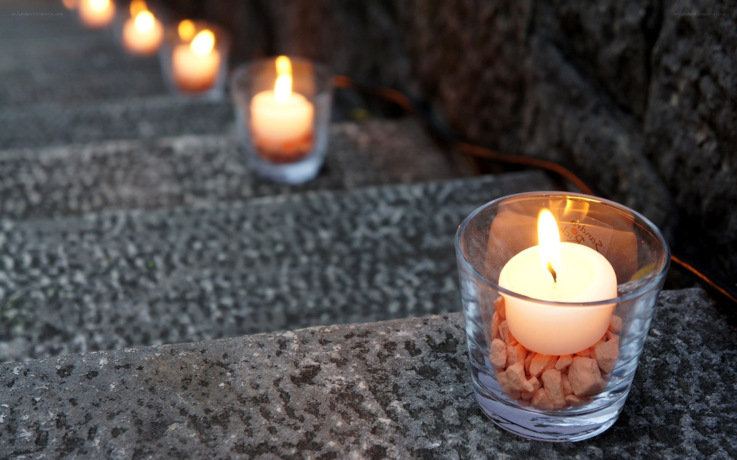Candles on stone steps