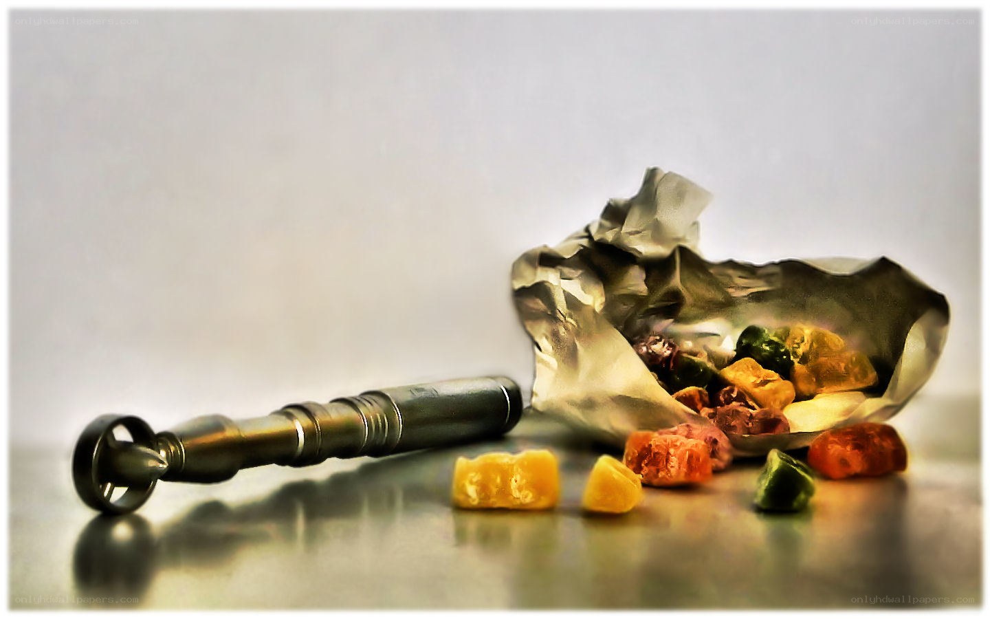 Candy and a device on table
