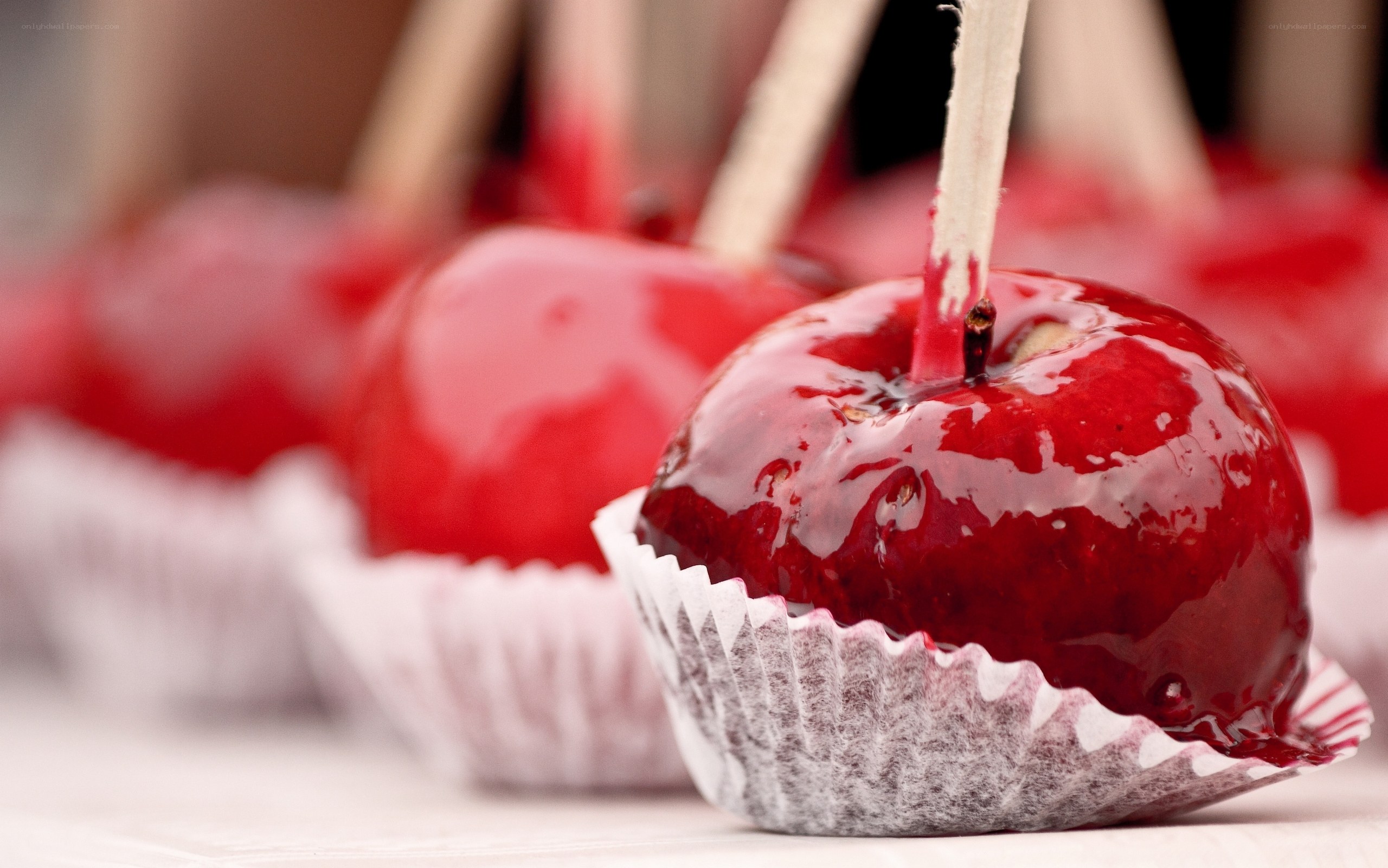 Candy apples in paper cups