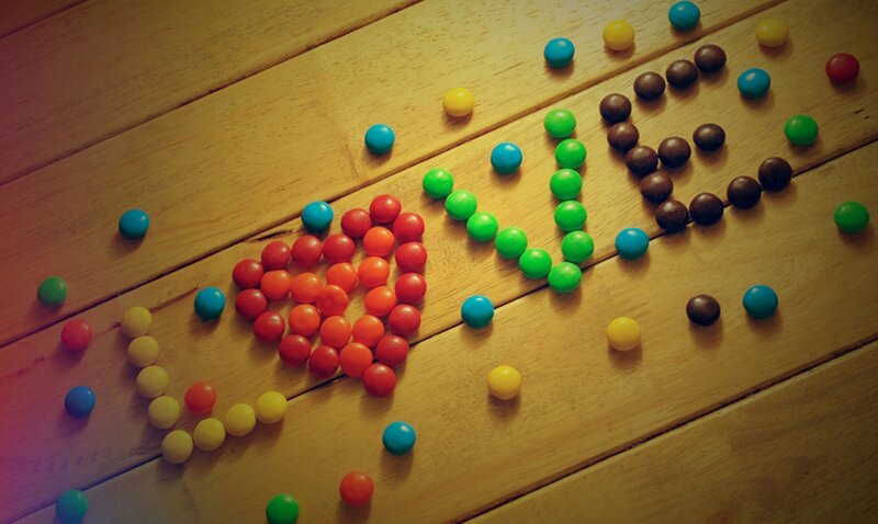 Candy Arranged on Wood