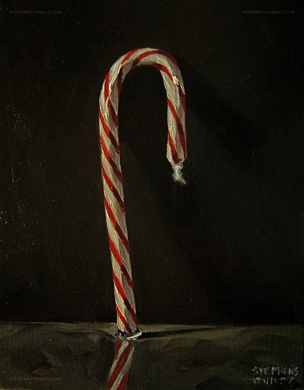 Candy cane on dark background