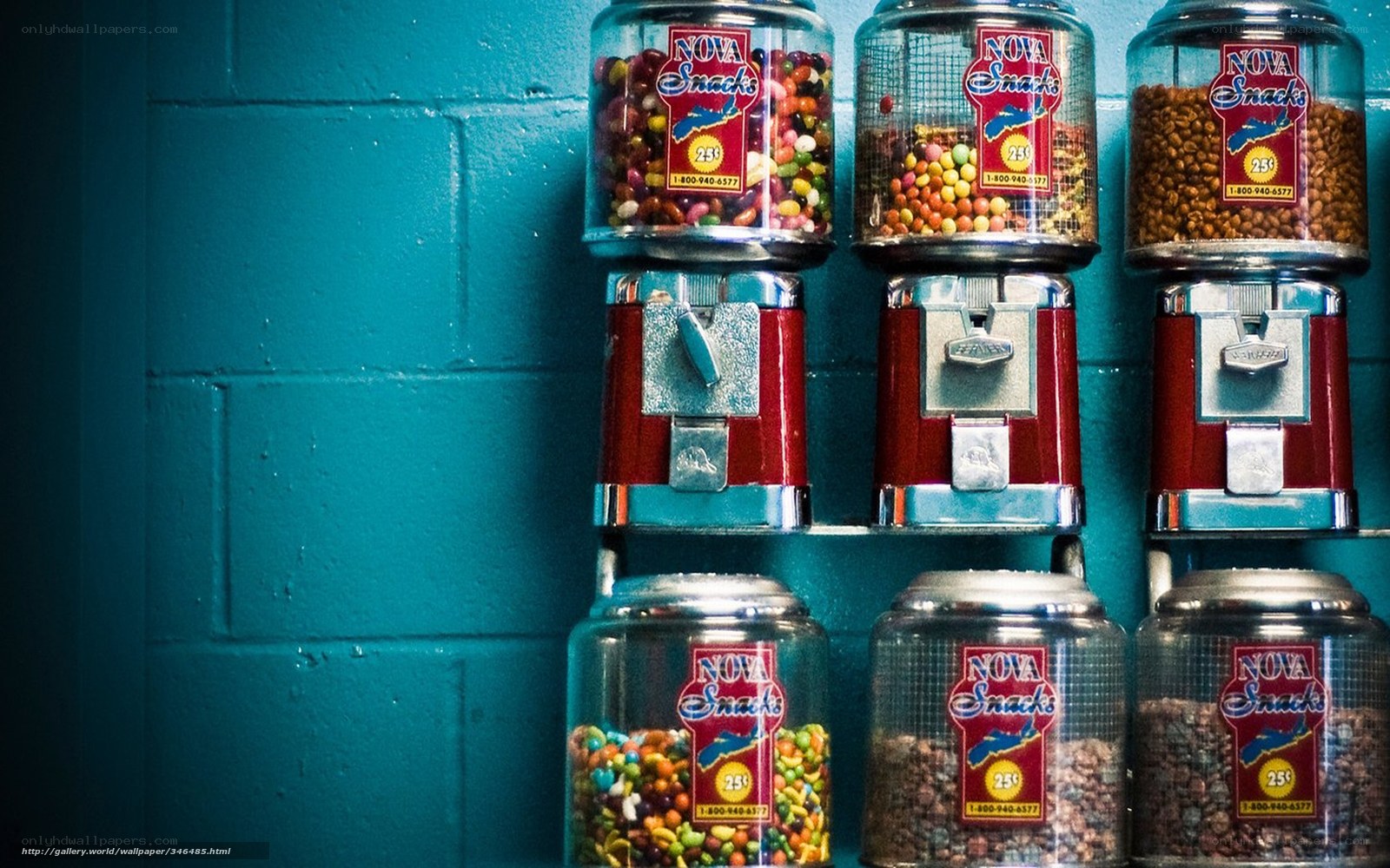 Candy dispensers on blue wall