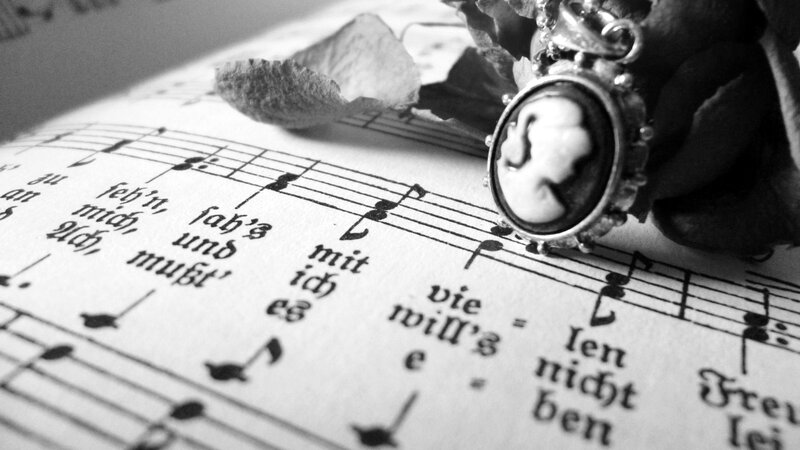 Cane Pendant on Sheet Music