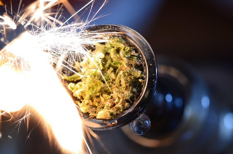 Cannabis being lit with a sparkler