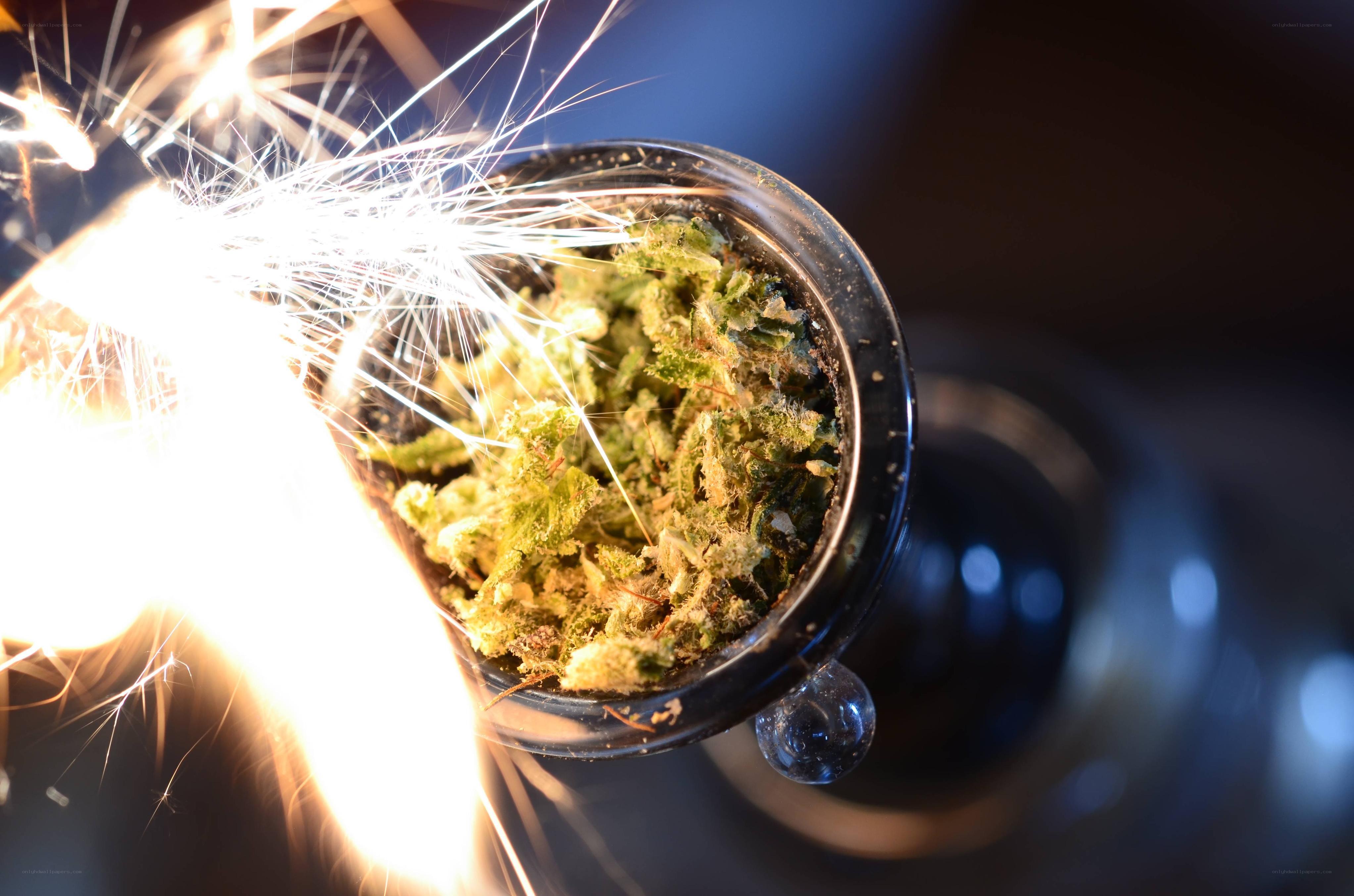 Cannabis being lit with a sparkler