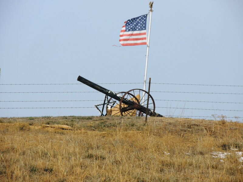 Cannon and Flag on Hill
