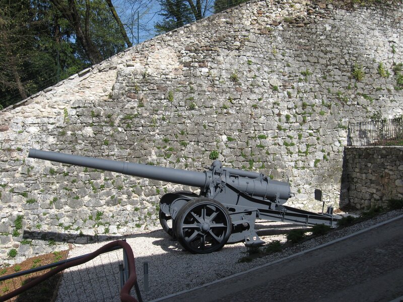 Cannon in front of stone wall