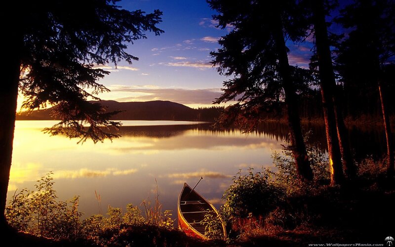 Canoe at sunset on a lake