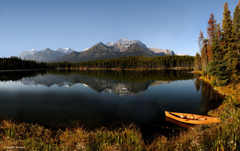 Canoe by a mountain lake