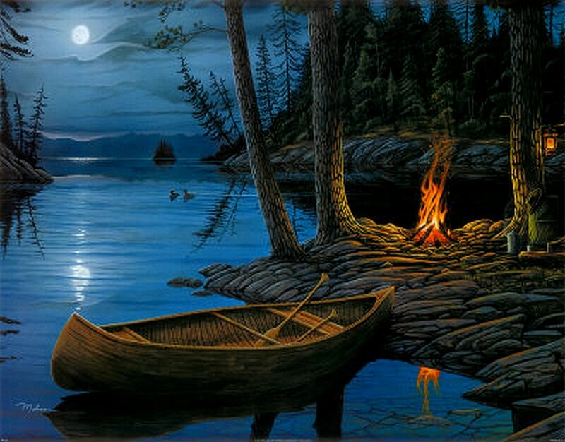 Canoe by moonlit lake