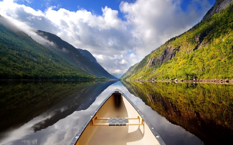 Canoe on a Lake — Blue, Serene, Afternoon