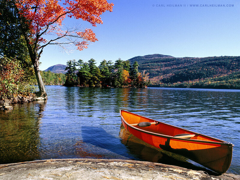 Canoe on a lake in autumn