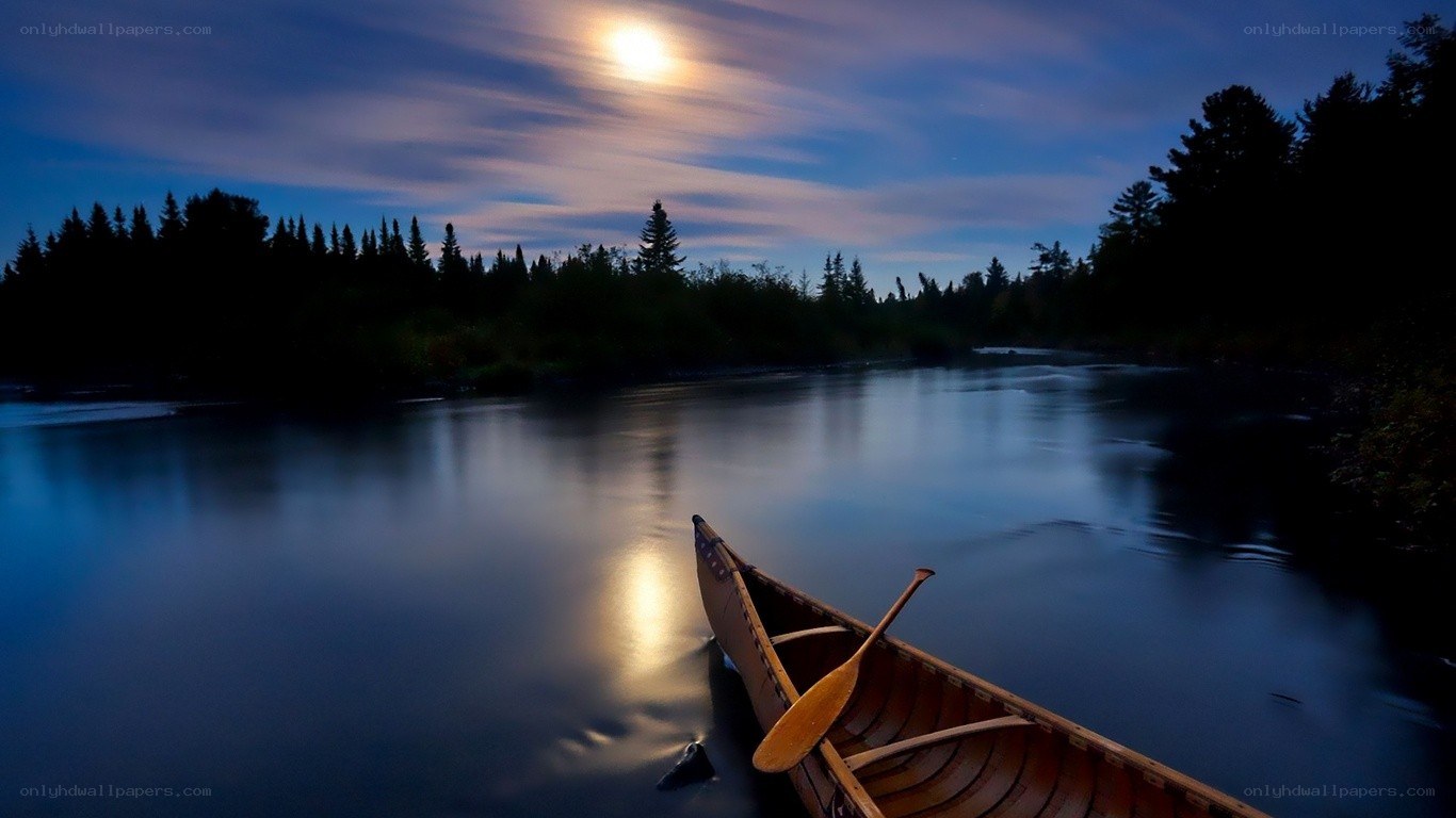 Canoe on a moonlit river