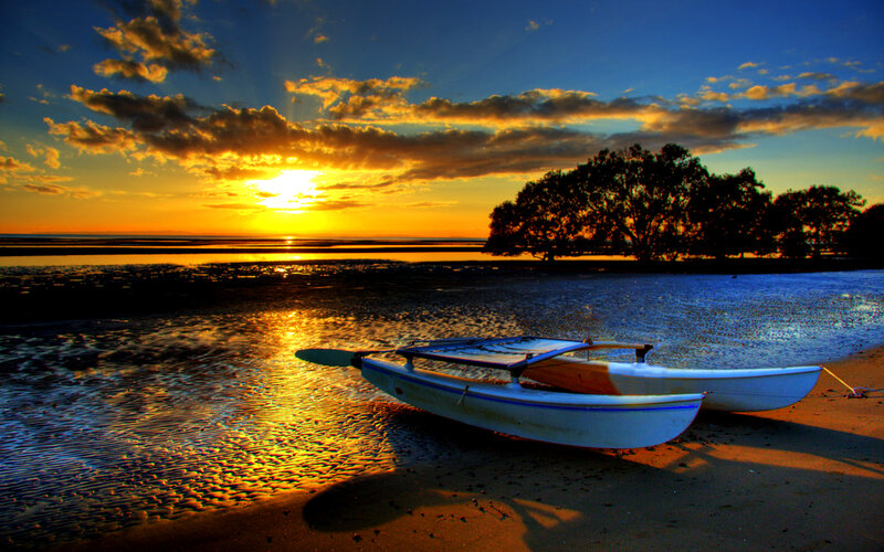 Canoe on Beach at Sunset