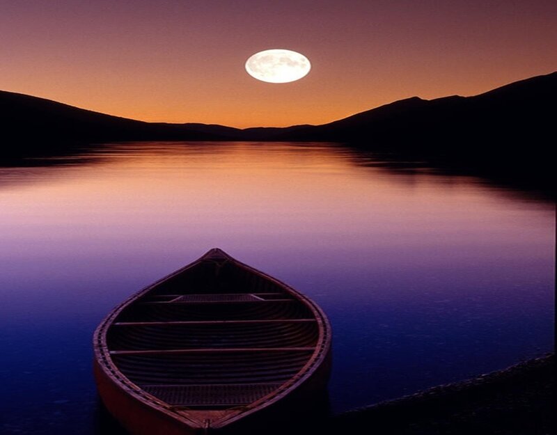 Canoe on Lake at Night