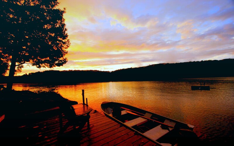 Canoe on Lake at Sunset — Orange